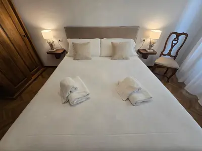 Letto o letti in una camera di La Casa di Lia