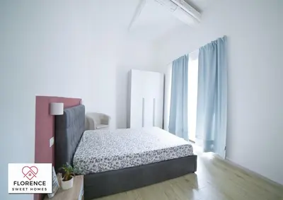 Letto o letti in una camera di Santa Caterina Apartment by Florence Sweet Homes