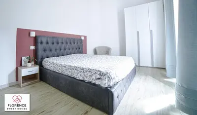 Letto o letti in una camera di Santa Caterina Apartment by Florence Sweet Homes