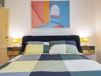 Letto o letti in una camera di Apartment Duomo Apartament by Interhome