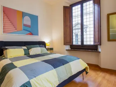 Letto o letti in una camera di Apartment Duomo Apartament by Interhome