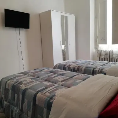 Letto o letti in una camera di Emerald guest house