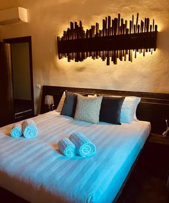 Letto o letti in una camera di Opus Firenze Boutique B&B Santa Croce City Center