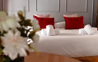 Letto o letti in una camera di Duomo Sky Loft Ricasoli