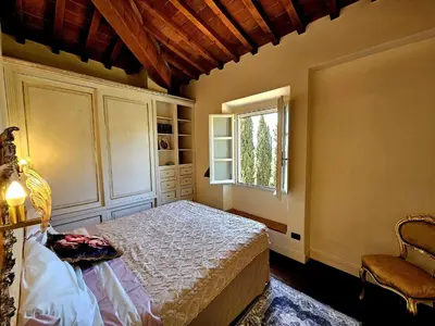 Letto o letti in una camera di Casa Orchidea