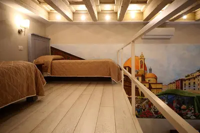Letto o letti in una camera di B&B Locanda Il Salimbecco