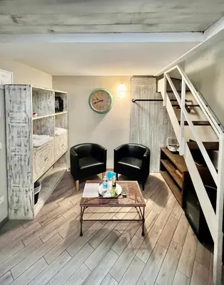 Letto o letti in una camera di B&B Locanda Il Salimbecco