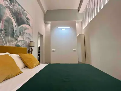 Letto o letti in una camera di Pilastri - Attractions at your Fingertips - PLUS