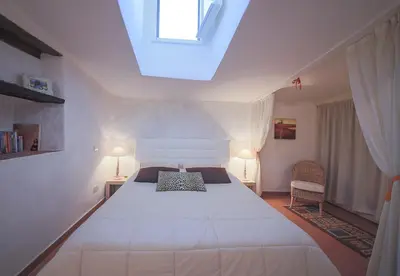 Letto o letti in una camera di Apartments Florence Piazza Signoria Terrace