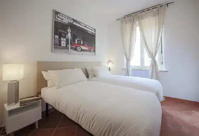 Letto o letti in una camera di Apartments Florence Ponte Vecchio San Jacopo