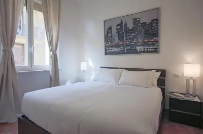 Letto o letti in una camera di Apartments Florence Ponte Vecchio San Jacopo