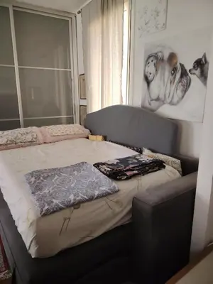 Letto o letti in una camera di Turisti nella natura in città d'arte