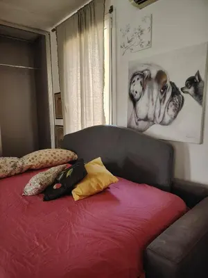 Letto o letti in una camera di Turisti nella natura in città d'arte