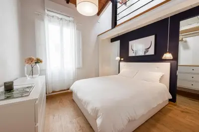 Letto o letti in una camera di Apartments Florence - The Pavilion