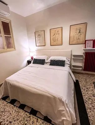 Letto o letti in una camera di Acacia Firenze - Olmo