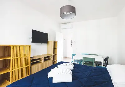 Letto o letti in una camera di Casa di Claudio-Near City Center