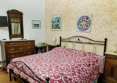Letto o letti in una camera di Casal de' nonni