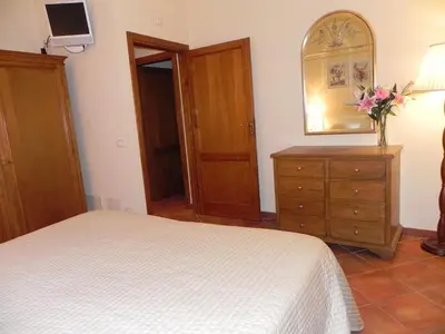 Letto o letti in una camera di Letizia e Comfort a San Frediano