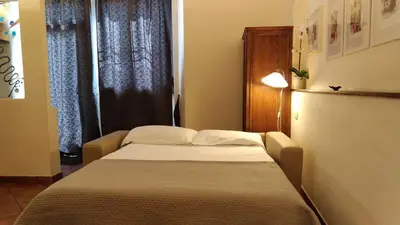 Letto o letti in una camera di Confort e stile a San Frediano