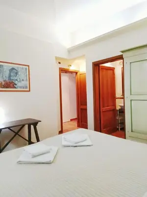 Letto o letti in una camera di Confort e stile a San Frediano