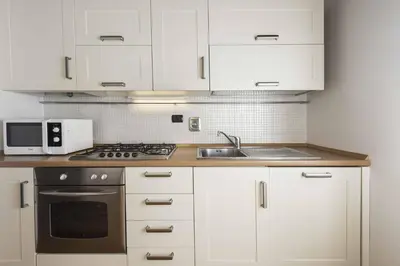 Cucina o angolo cottura di Loft al Conventino by MMega