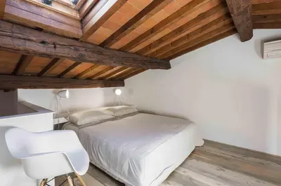 Letto o letti in una camera di Loft al Conventino by MMega