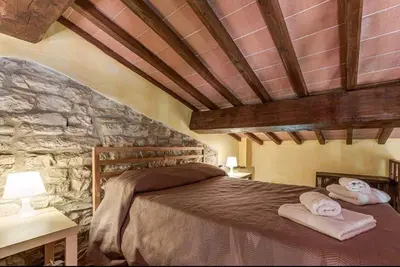 Letto o letti in una camera di Wine Experience - Villa Vener