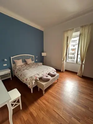 Letto o letti in una camera di Family Apartment Casa di Fabrina