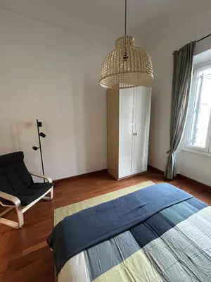Letto o letti in una camera di Family Apartment Casa di Fabrina