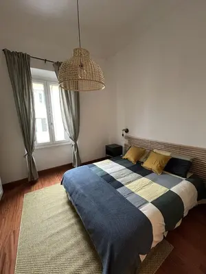 Letto o letti in una camera di Family Apartment Casa di Fabrina