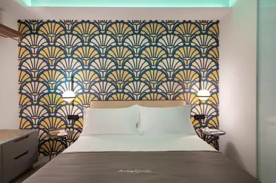 Letto o letti in una camera di Arts & Crafts Luxury Suites