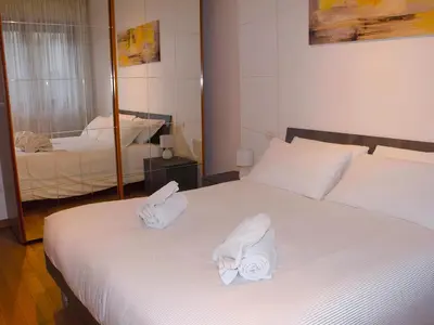 Letto o letti in una camera di Casa IL FIORE
