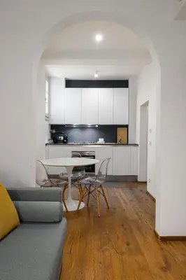 Cucina o angolo cottura di UNYCA - Santa Croce Florence Apartment