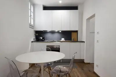 Cucina o angolo cottura di UNYCA - Santa Croce Florence Apartment