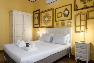 Letto o letti in una camera di UNYCA - Florence Central Loft