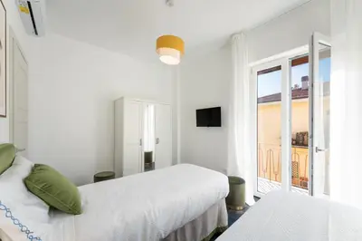 Letto o letti in una camera di Rinascimento Apartments