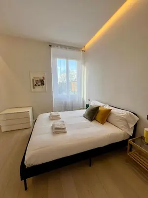 Letto o letti in una camera di Modern Florence