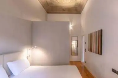 Letto o letti in una camera di The Beauty of Santa Croce