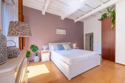 Letto o letti in una camera di San Frediano luxury Suite