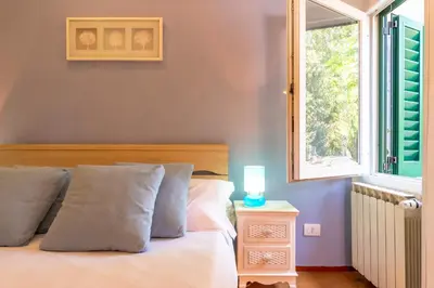 Letto o letti in una camera di San Frediano luxury Suite