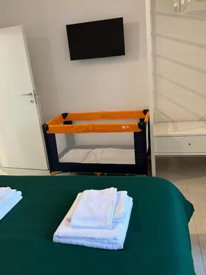 Letto o letti in una camera di Lumà Apartment - Florentia