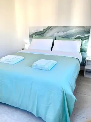 Letto o letti in una camera di Lumà Apartment - Florentia