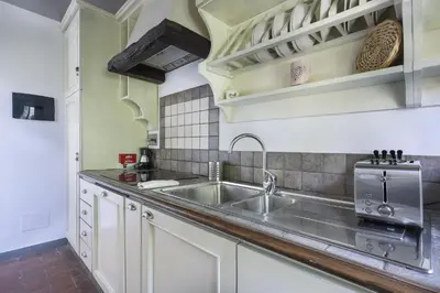 Cucina o angolo cottura di Family Apartment in Oltrarno Florence