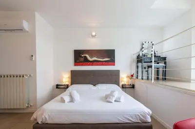 Letto o letti in una camera di Relax&Discover Florence! Cozy apt in Cure district