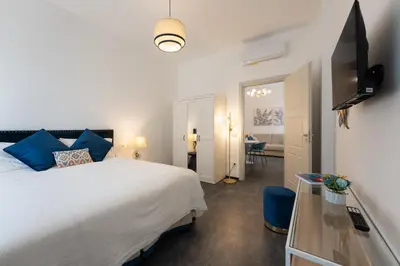Letto o letti in una camera di Rinascimento Apartments