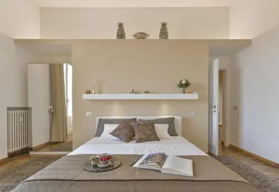Letto o letti in una camera di La Magnifica