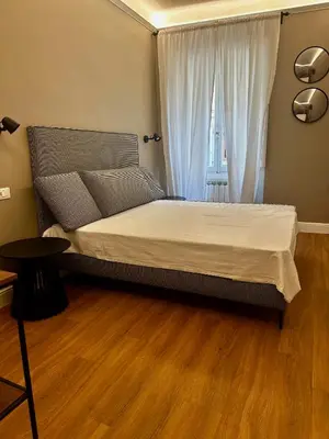 Letto o letti in una camera di Novella's Apartment
