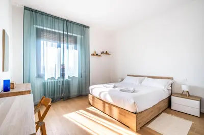 Letto o letti in una camera di NEW 2BDR - Attico Panoramico con Posto Auto