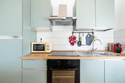 Cucina o angolo cottura di Panoramic Penthouse with Parking Space 2BDR by Hôtea
