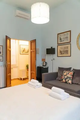Letto o letti in una camera di Appartamento Firenze in Libertà